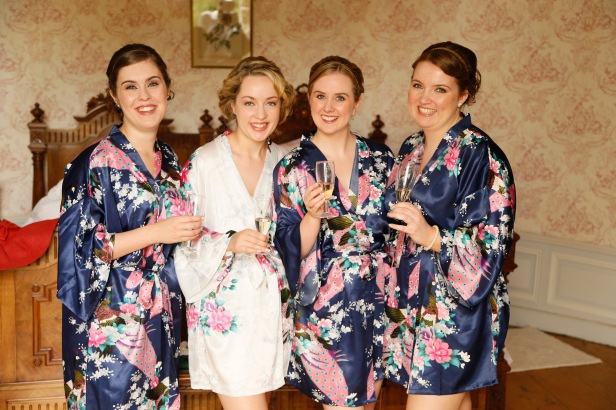 Bride and bridesmaids in dressing gowns in a French chateau